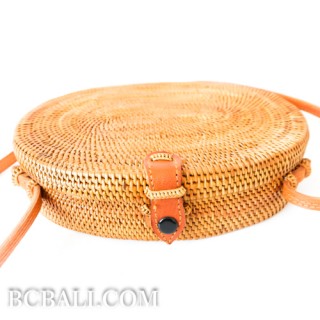 Oval rattan handbag ata hand woven leather handle 